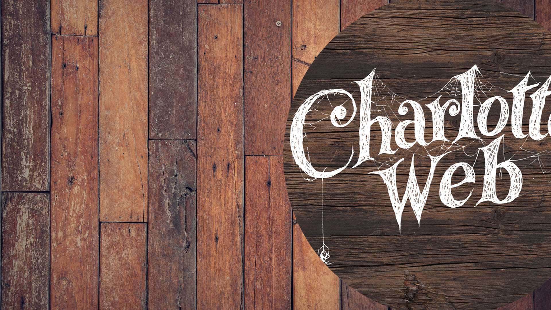 Wooden background with the Charlotte's Web Logo